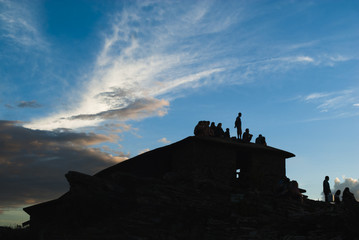 Obraz premium People silhouette at sunset in Brazil