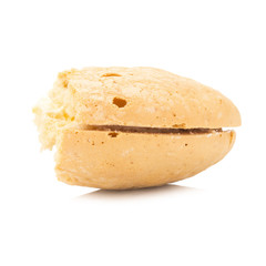 coconut flavor cookie cake with cream filling isolated on white background. bite