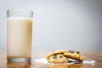 milk and cookie  on a wooden background. floor table