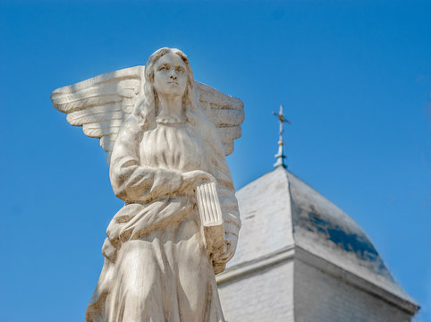 Angel statue Marble, Catholic Church, blue background