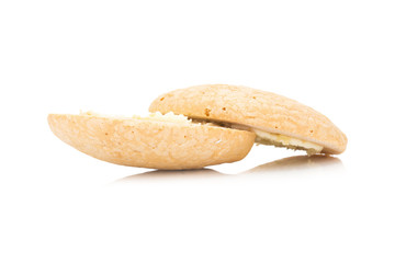 coconut flavor cookie cake with cream filling isolated on white background
