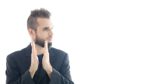 Envious bearded man in suit clapping hands, studio isolated on white background.