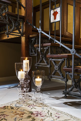 candles in the lamps near the wooden steps