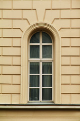 Facade of a window of an old building in the center of the city.