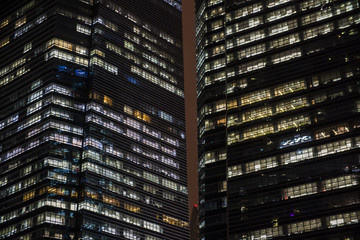 Fototapeta na wymiar night skyscrapers closeup