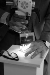 Microscope on the stand of the manufacturer of optical products at the exhibition of medical equipment