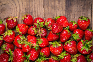 natural food background with strawberry on wood table