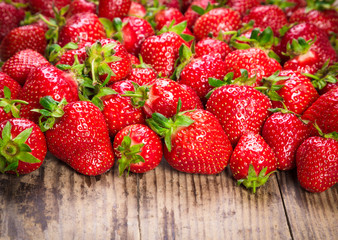 closeup of food background with strawberry on wood table