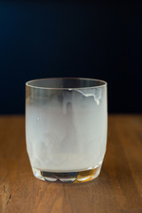 Empty hot milk cup after drink on wood table