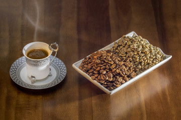 Naklejka premium white cup hot coffee and coffee grains