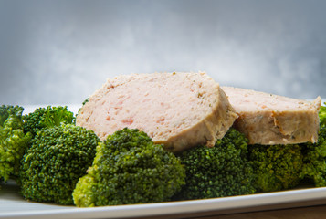 plate of meat loaf with broccoli