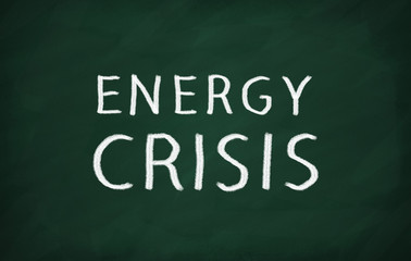 On the blackboard with chalk write ENERGY CRISIS