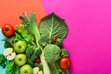 Flat lay of raw vegetables on abstract background