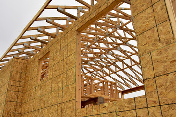 Wood frame residential building under construction.