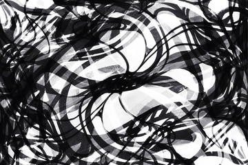 Abstract photo background, black texture curved brush strokes painted pattern over white wall.