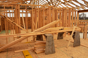 Fototapeta premium Wood frame residential building under construction.