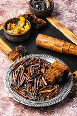 gathering roots and herb