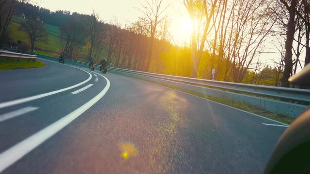 motorbike on the road riding. having fun riding the empty road on a motorcycle tour / journey