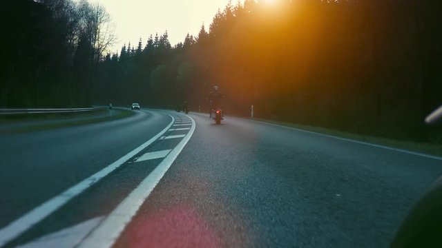 motorbike on the road riding. having fun riding the empty road on a motorcycle tour / journey