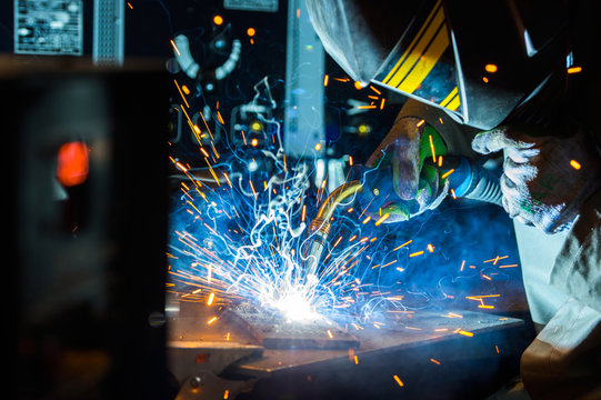 Electric Welder Working With Argon