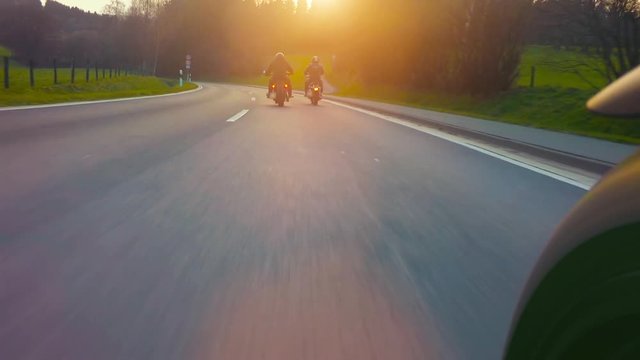 motorbike on the road riding. having fun riding the empty road on a motorcycle tour / journey