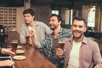 Friends having fun in pub