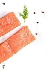 Photo of slices of salmon on white with copyspace