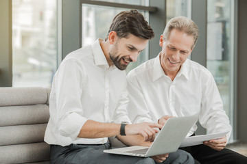 Fototapeta premium Stylish businessmen working in office
