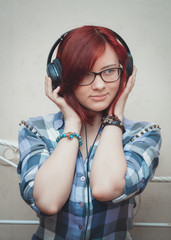 Portrait of a young girl with headphones