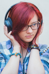 Portrait of a young girl with headphones