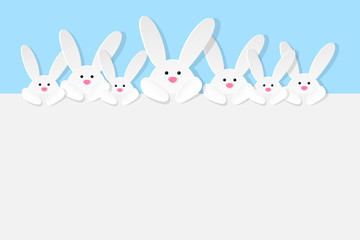 Easter bunnies on blue background with copyspace. Vector.