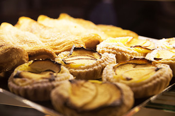 Sweet pastry with jam in the shop window