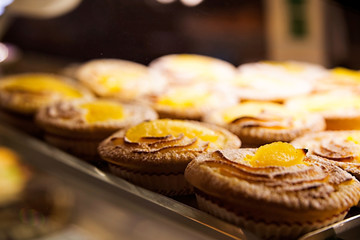 Sweet pastry with jam in the shop window