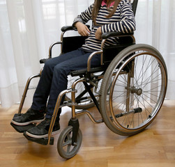 paraplegic young girl in a wheelchair
