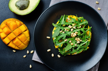Avocado mango arugula pine nuts Mozzarella salad