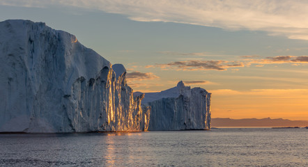 Fancy icebergs of different forms in the Disko Bay. Their source is by the Jakobshavn glacier. This...