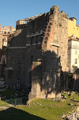 Ruins of Trajan Markets, built in 2nd century AD by Apollodorus of Damascus in Ancient Rome. Italy. The world-famous monuments of architecture adjoin the usual dwelling houses. Rome, Italy