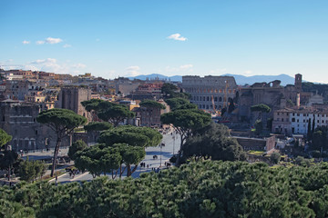 Fototapeta premium The ruins of Colosseum in the city center of Rome, Italy, winter morning view