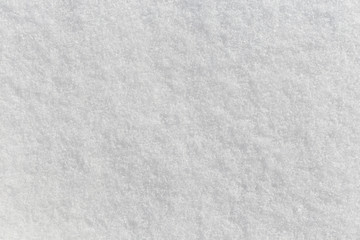 Obraz premium The white snow surface as a background texture