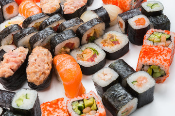 Set of sushi, maki and rolls isolated on white