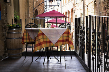 The cozy cafe on the street in Italy