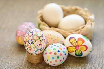 Fototapeta na wymiar Colored drawings on Easter eggs. 