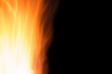 Flame isolated on black background. Design element.