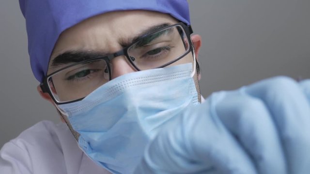 Personal Or Patient Point Of View, POV.. Dentist Looking Inside The Mouth And Being Disappointed By What He His Seeing.