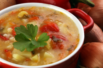 Barley and vegetable thick healthy soup. Krupnik thick Polish soup made from vegetable or broth, containing potatoes and barley groats