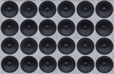 Concept of powerful audio speakers. Background of black metal grid for the speaker close-up. Audio equipment. Set of subwoofer element, black loud speaker