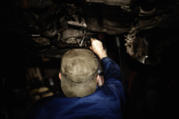 Fototapeta na wymiar Car mechanic at work