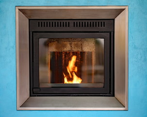 modern stove to decorate and heat the house with the fire burnin