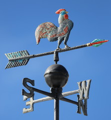 weathervane to mark the wind with the arrow - obrazy, fototapety, plakaty