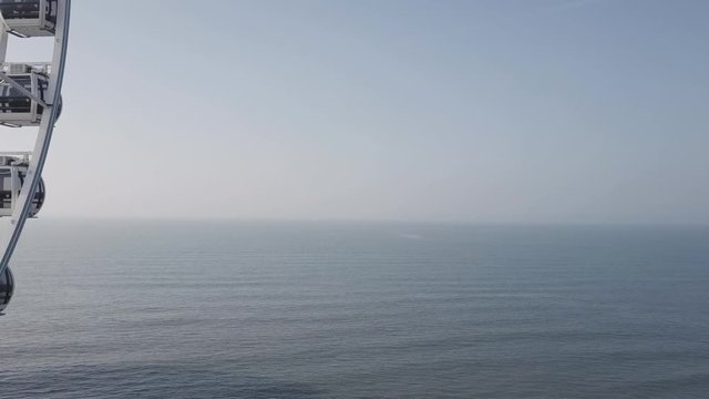 ferris wheel at beach schevening